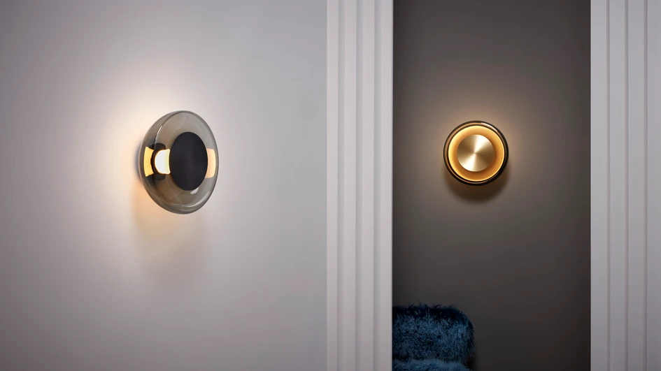 Inspired by the balance and hypnotic qualities of a pendulum, the pendant is suspended on a sculpted brass rod. It can be used as a single feature or as a grouping