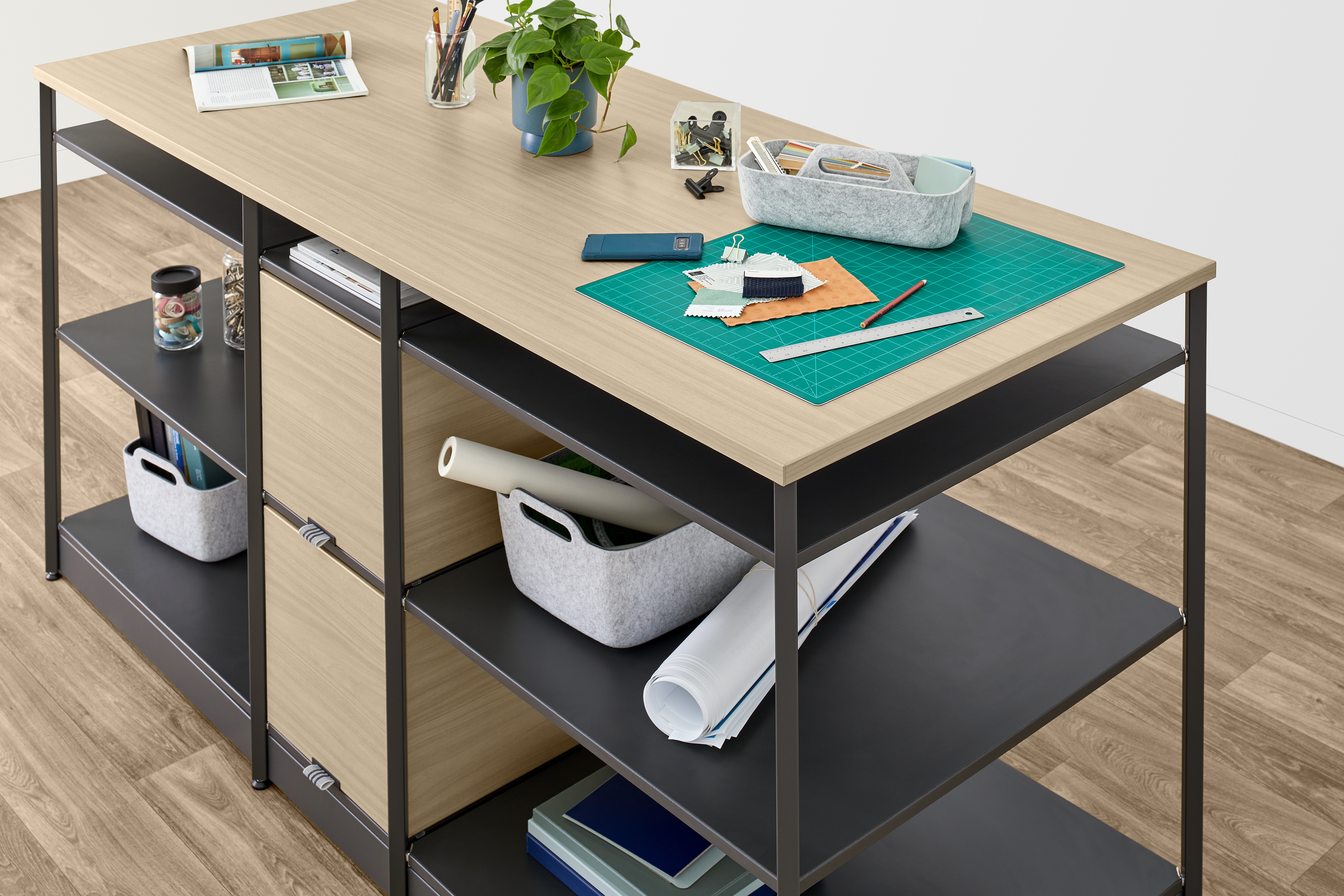 Work Islands (pictured) and Work Bridges can be added to blueprints as central areas where teams converge for informal meetings, or where more physical creative tasks can be performed