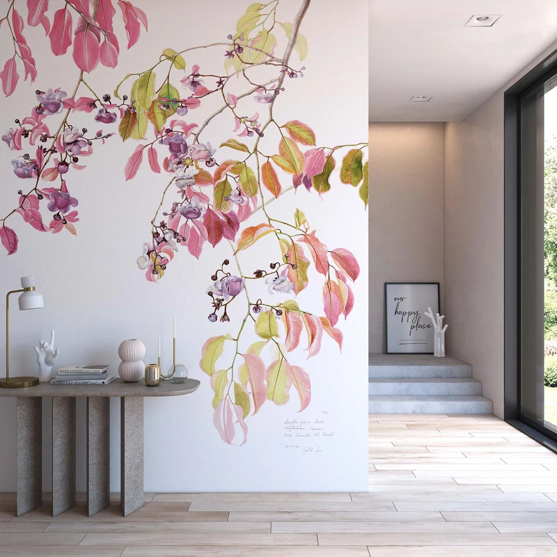 Native Brazilian flowers and plants adorn Tecnografica’s latest wallpaper collection. Pictured here, the branches of the pink-toned Sapucaia design