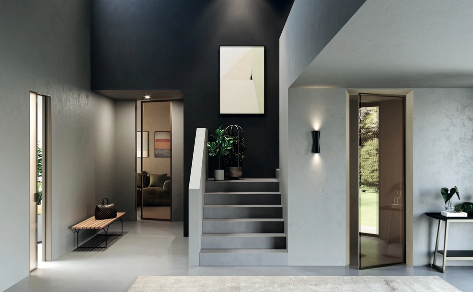 Der Türrahmen Eclisse 40 aus Aluminium ist in einer Vielzahl von Oberflächen erhältlich und lässt sich mit Türen aus Aluminium und Glas kombinieren, sodass er sich in alle Arten von Inneneinrichtungen integrieren lässt