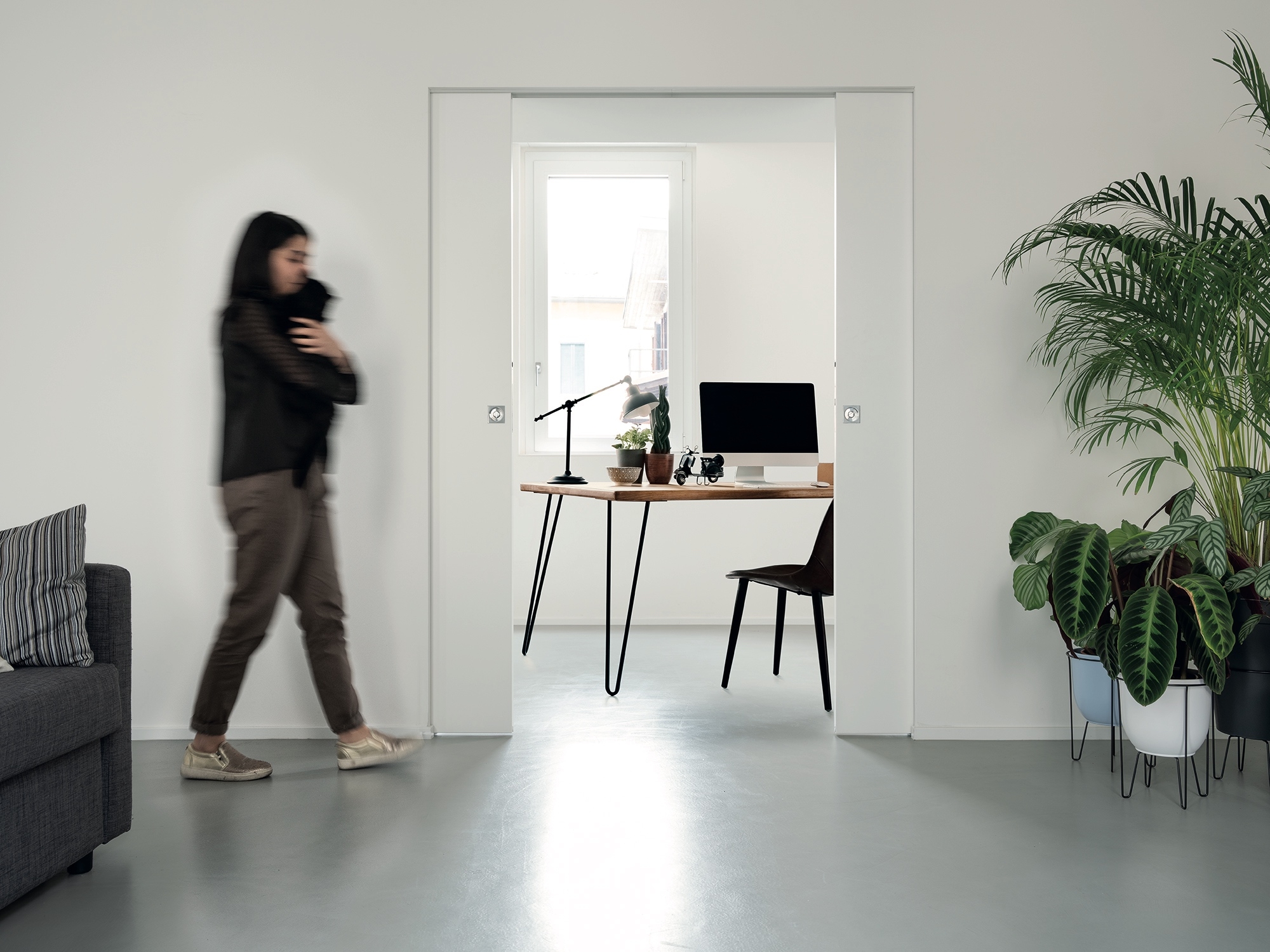 In contrast to its art nouveau shell, the interior architecture of Casa Frida is all sharp angles, clean lines, and discrete doorways courtesy of Eclisse’s Syntesis® series