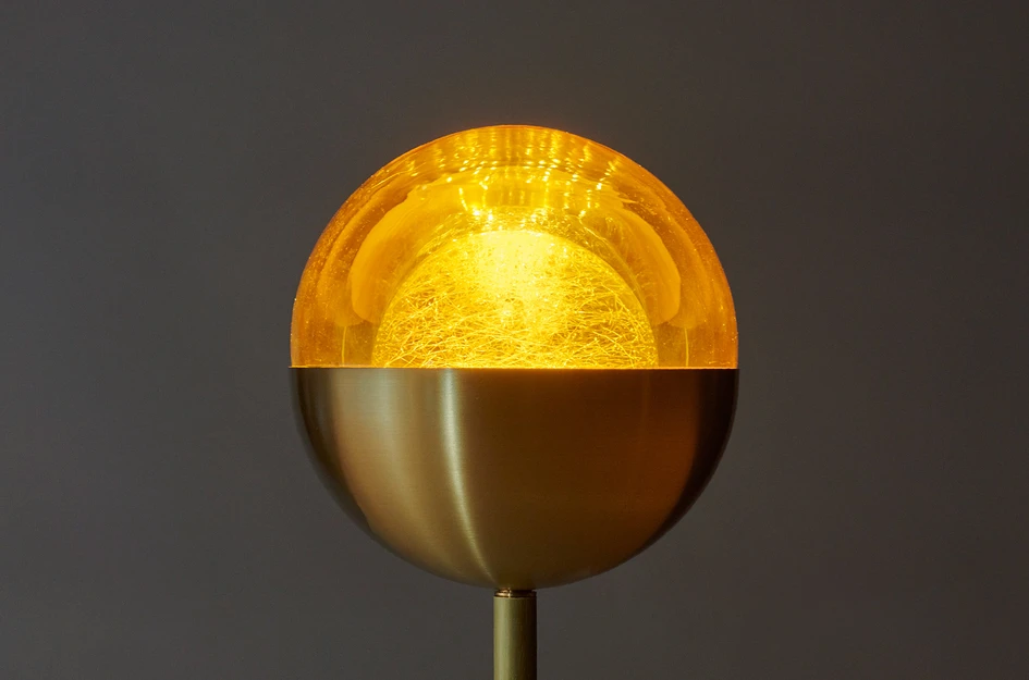 Designed by Shakúff’s senior engineer Erno Saller, the new Bloom collection also features floor lamp and table lamp options, both housing blown glass Kadur Drizzle pendants in brass half-spheres