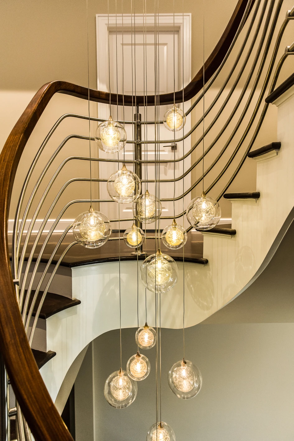 Shakúff works with a number of glass artists around the world. The Kadur Drizzle collection features blown glass orbs within orbs, each filled with glass fibres creating a dramatic diffused glow