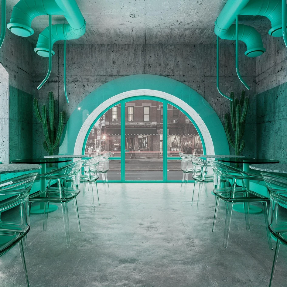Strong emerald green creates a striking contrast with the concrete backdrop at New York's In Harmony with Nature Café by Reutov Design. Photo: Reutov Dmitry, Gerner Ekaterina