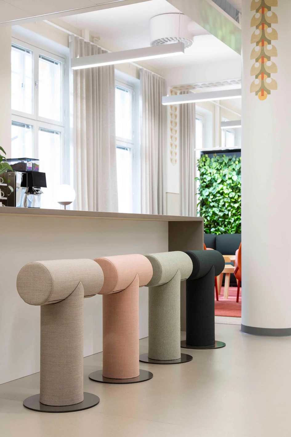 Mint & More Creative's Urban3 coworking hub features a colour scheme where the textiles' hues complement the building's original colourful ornaments. Photos: Esa Kapila