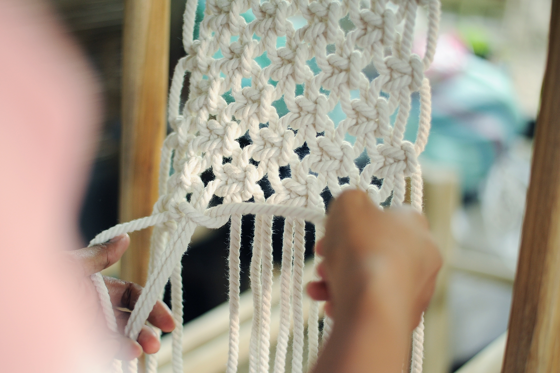 With a material mix of synthetic spoke and weave, natural teak, and natural rope macrame handmade in Java, the collections slot comfortably into the current call for 70’s style weaves