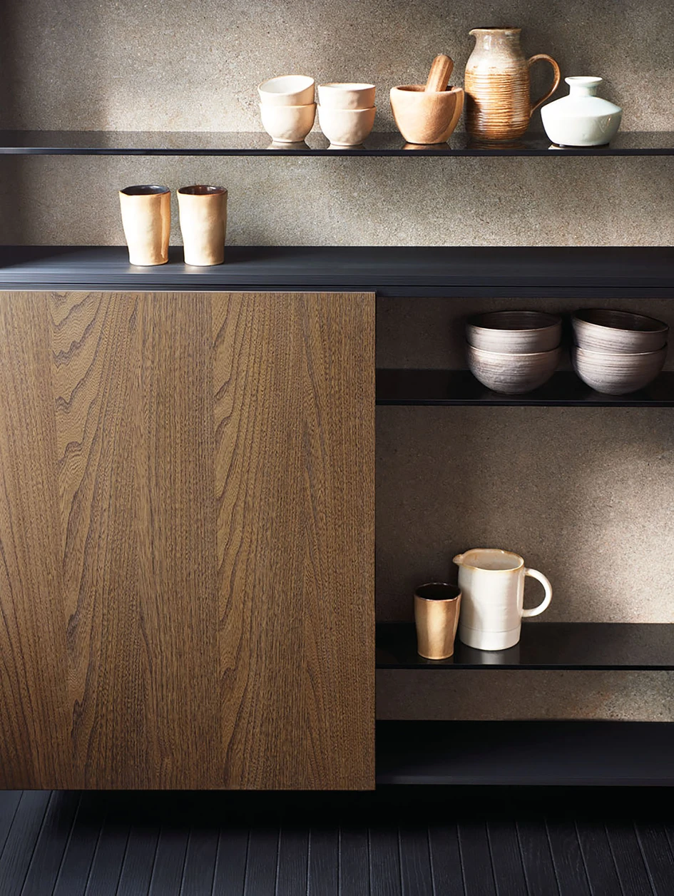 Dressup’s material palette smooths the aesthetic and functional shift between kitchen area and living area and opens up new possibilities for balance and flow