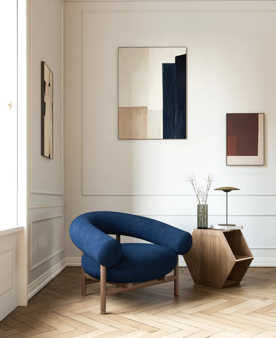 Inspiration for Loop is drawn from Danish modernism; its finely-tuned oak frame and curved seating lends it elegance, while the plump upholstery ensures deep comfort