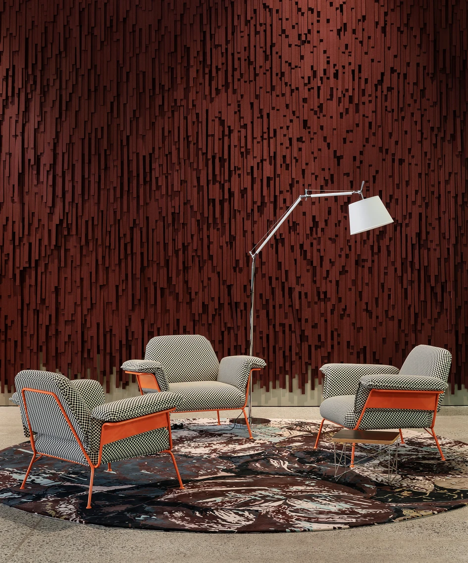 A wall at Auckland’s MediaWorks, composed of Autex Acoustics’ Cube panels that are cut and reassembled in careful compositions to make an irregular, sculptural surface, representing discordant noise