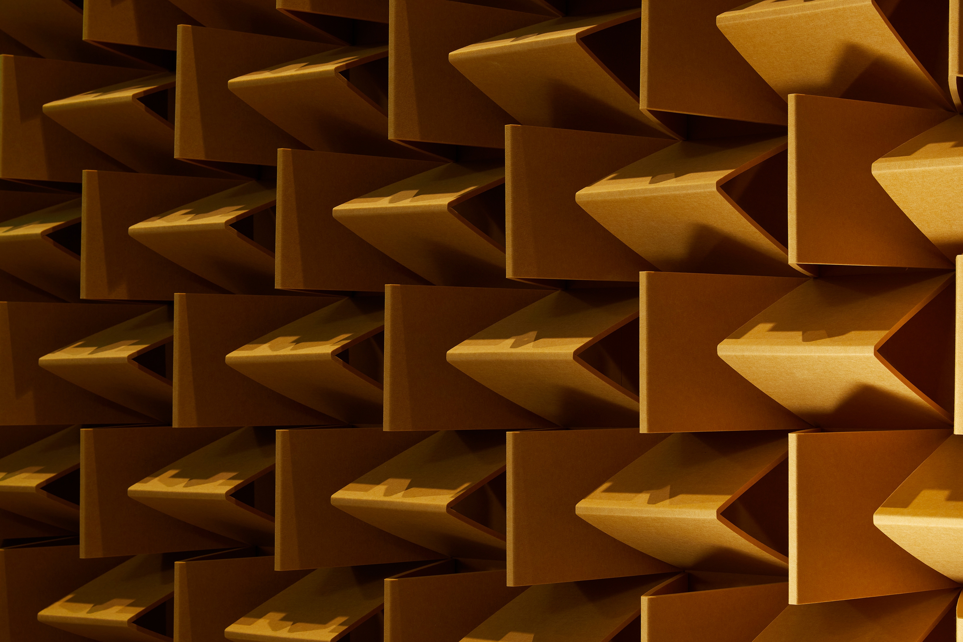 Solutions for overhead sound absorption include Groove finished Cube panels, the undulating slatted structure of the Frontier collection and the circular, cloud-like Horizon panels