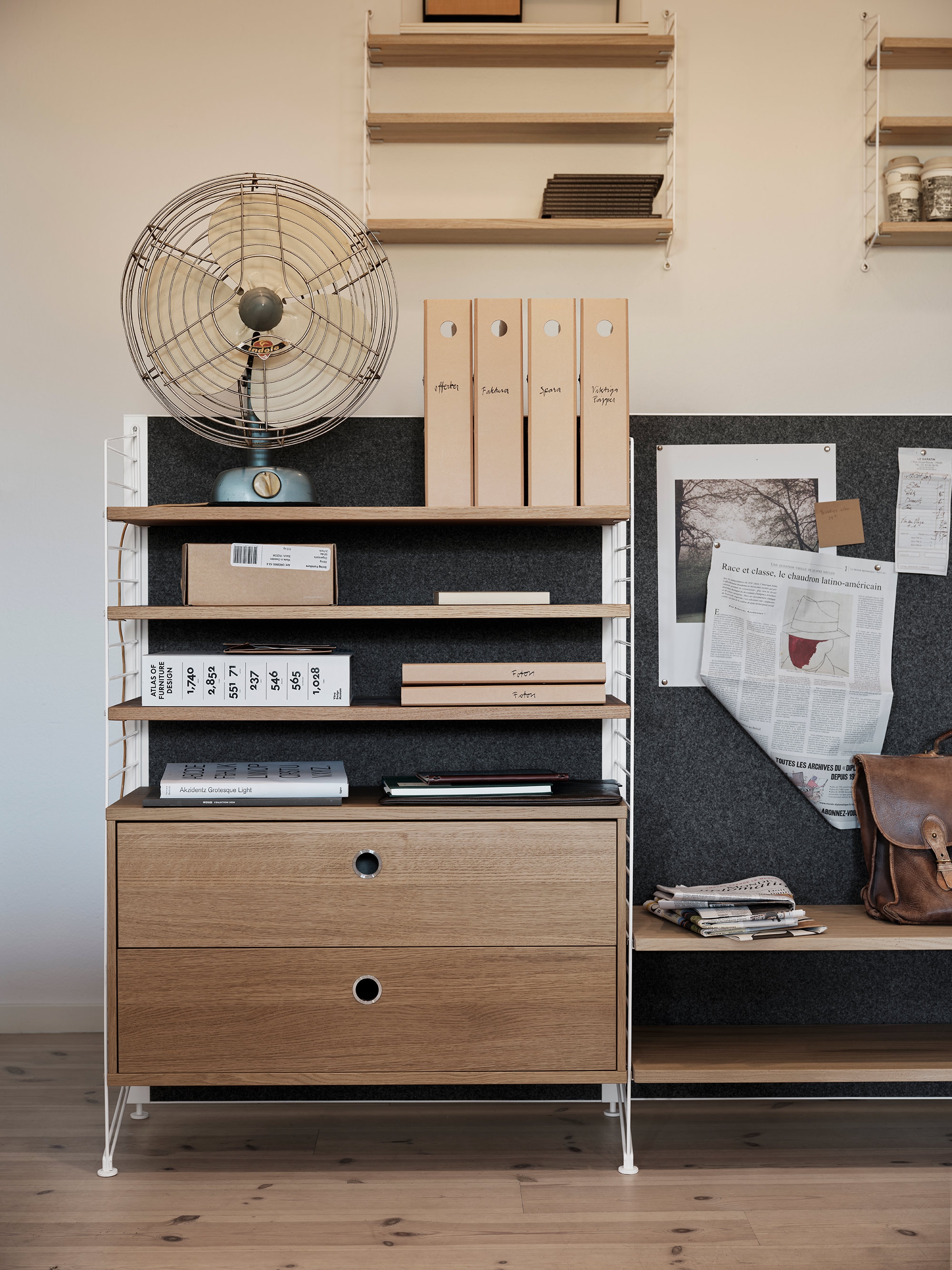 String Pocket, a compact floating version of String featuring three shelves, was developed in 2004 by Nisse Strinning, some 55 years after the original String shelving design was made 