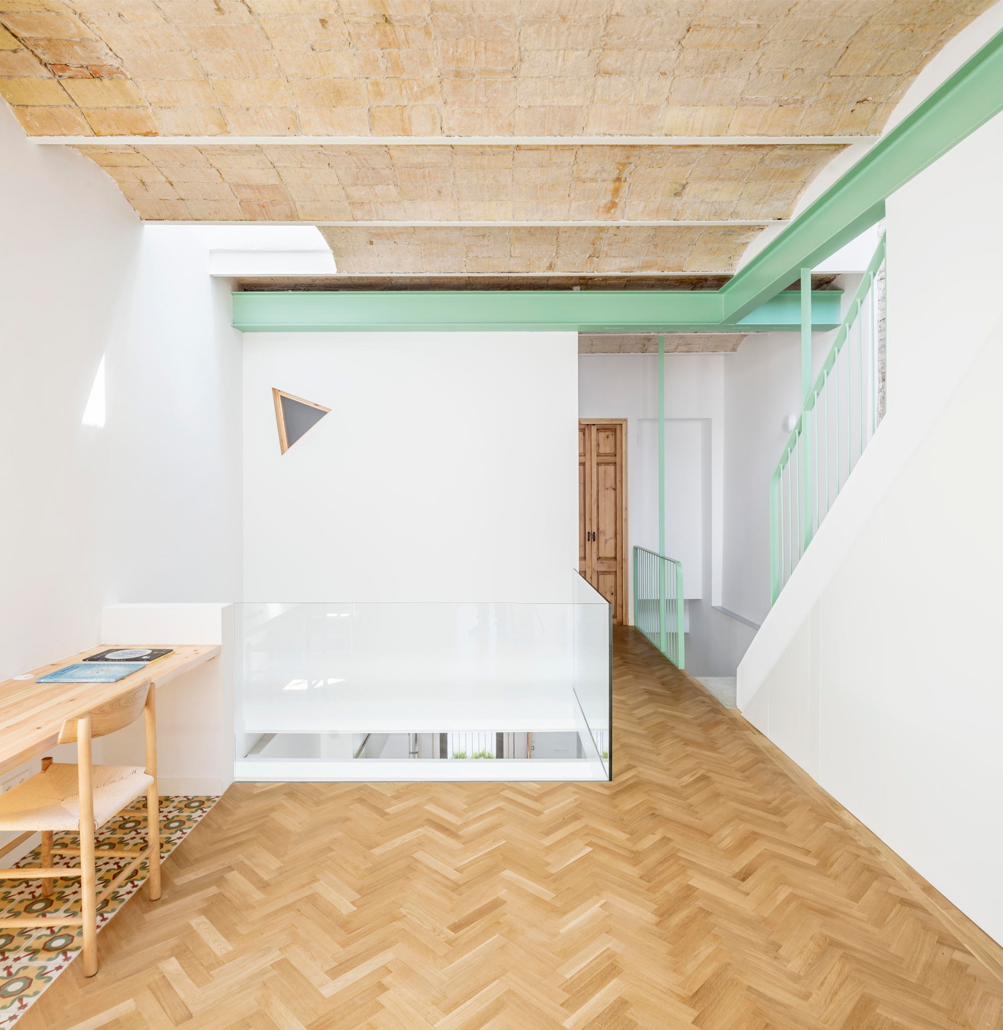 CAVAA Arquitectes' contemporary structural interventions, combined with retaining the traditional flooring elements, serve to ensure comfort for the inhabitants of Casernes House. Photos: Adrià Goula