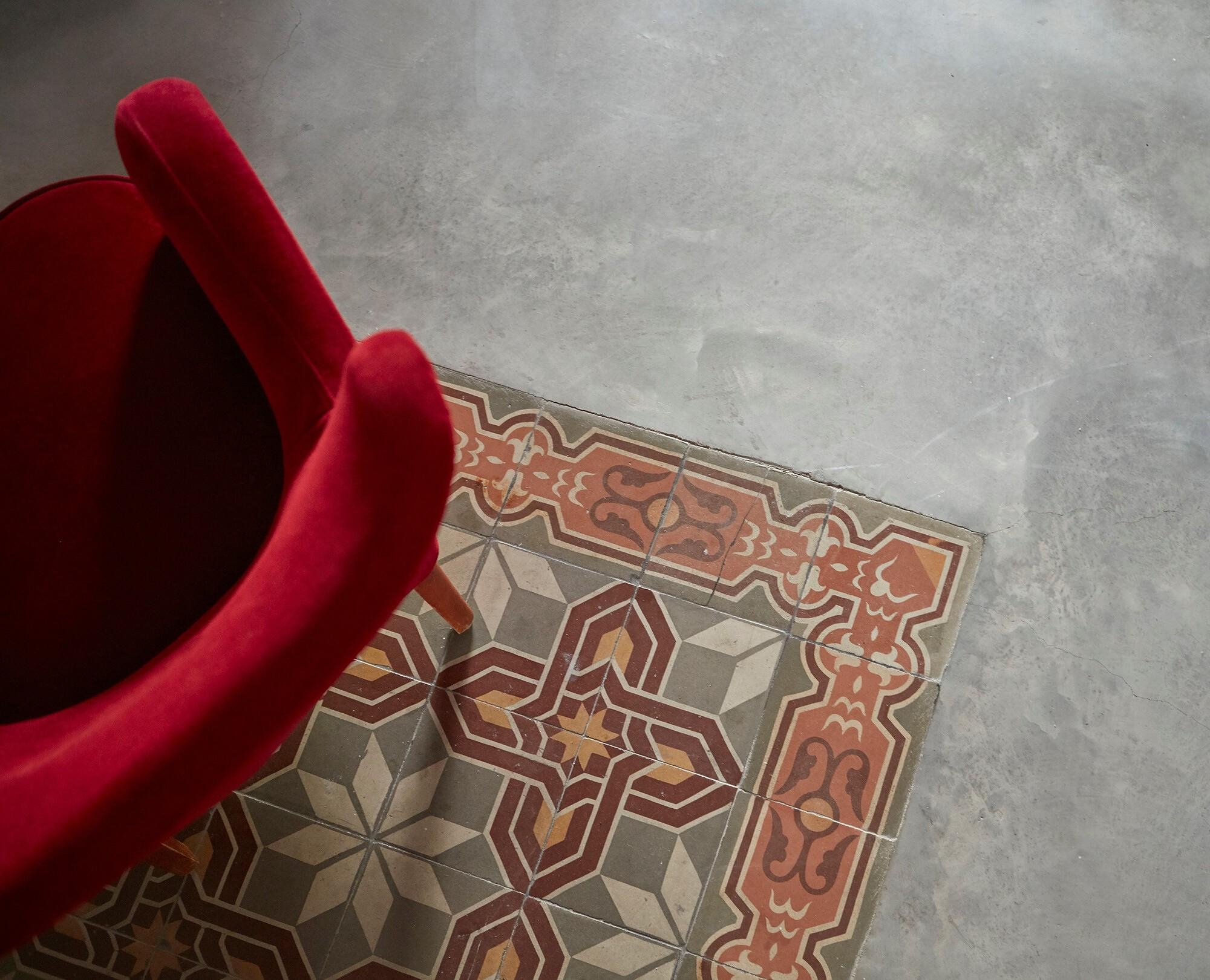 By reassembling existing patterned tiles within the new floors of the Mira House, Arturo Sanz combines period features with a dose of whimsy. Photos: Mariela Apollonio