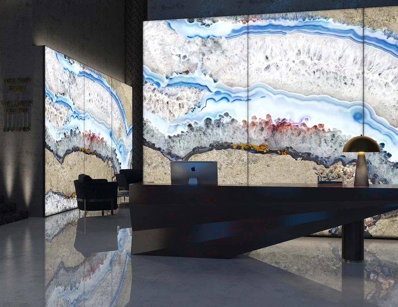 An inviting reception space sets a striking mood with Tecnografica’s Dècora Glass Giant Agate pattern