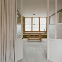 Open kitchen and living spaces, such as those in FOF Studio's NAN Residence, benefit from abundant light made possible by translucent partitions or clerestory windows. Photos: Biel Moreno