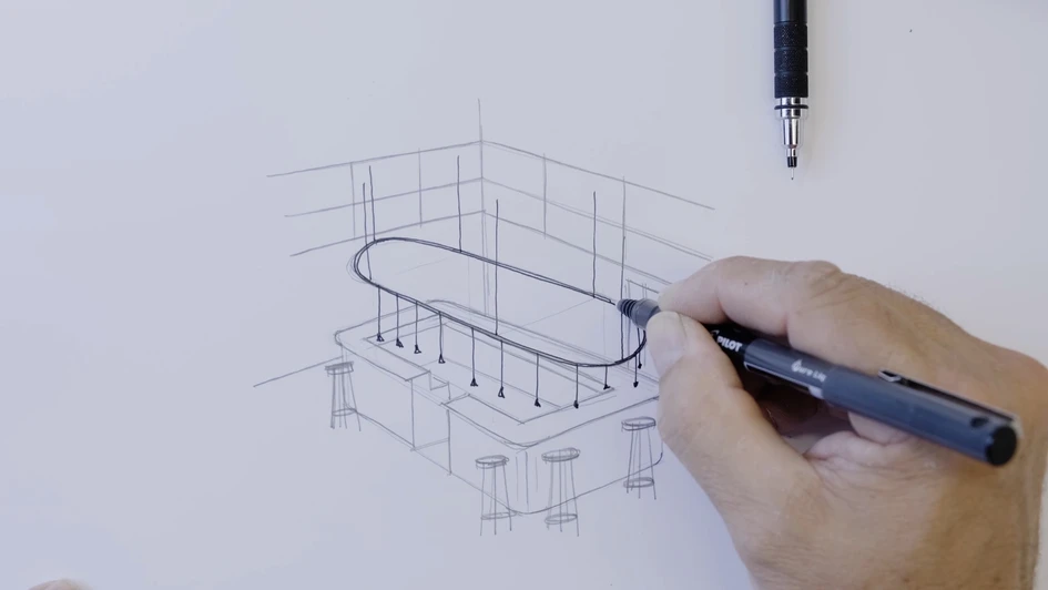 A designer refines the Skybell system with a curved profile above an open kitchen island