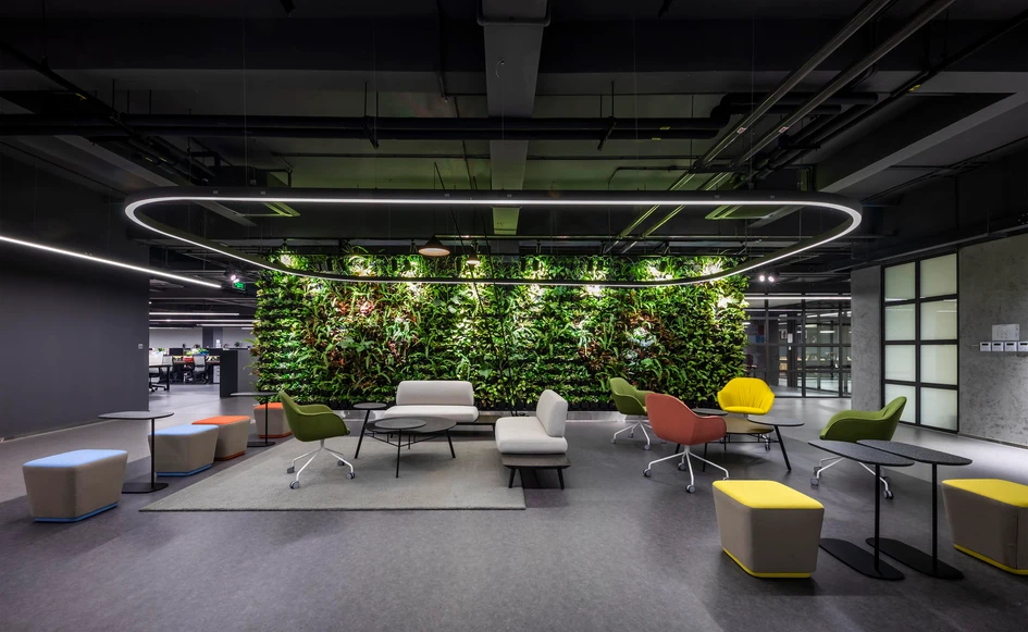 For Crystal Martin Vietnam Office, D&P Associates delineates different spaces by using soft colours against a dark background. Photos: Hiroyuki Oki