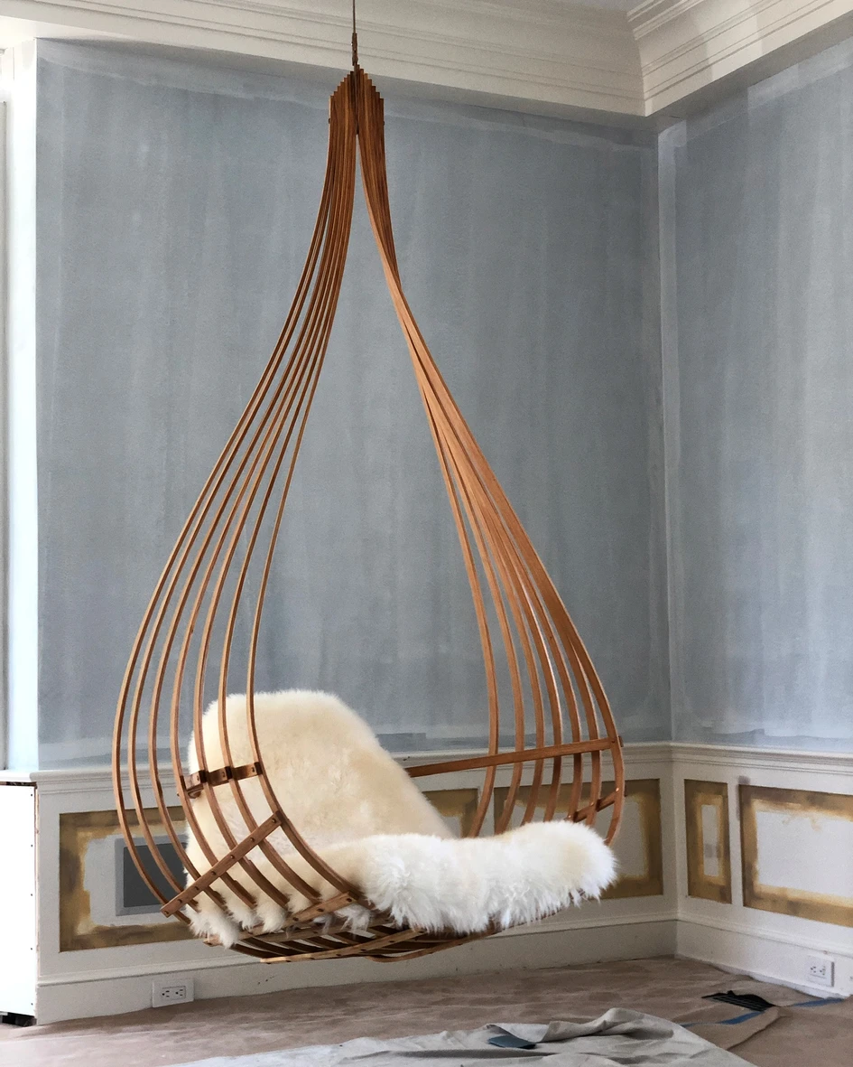 A craftsman and woodworker Michael Javidi trained to build traditional sailboats, and is exhibiting his own custom work during WantedDesign, including Le Nid swing chair, seen here