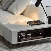 Tactile, elegant quilting – and the option of personalising Roger with Case side tables in various finishes – gives the design even more individuality