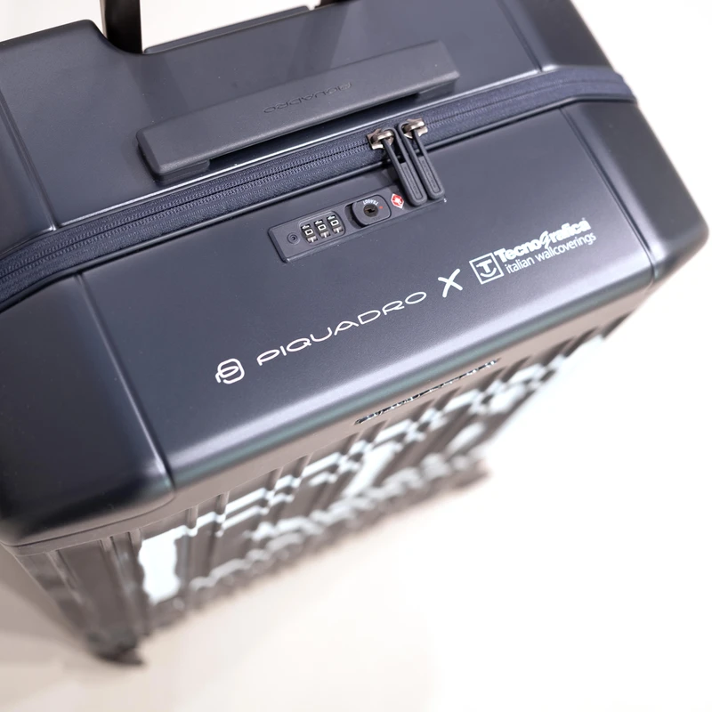 The suitcase, from Piquadro’s PQ-Light series is sleek, durable and engineered bespoke for Tecnografica