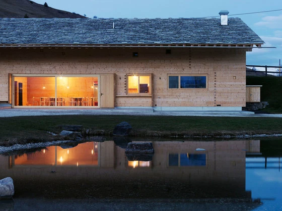 Davos Munts Lake's typically Swiss Ustrietta building sits alongside the swimming lake. Photo: Lucia Degonda