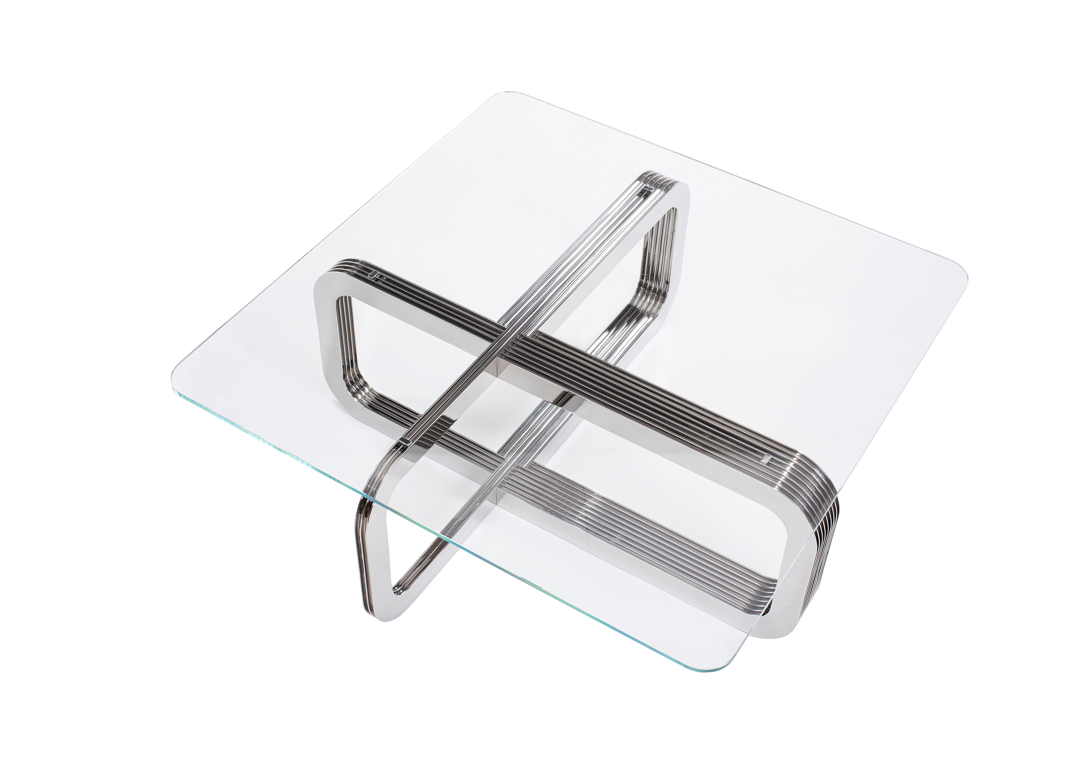As a functional, chrome sculpture in the centre of the room, the Ebb & Flow coffee table served as the stylistic basis for the creation of the entire collection
