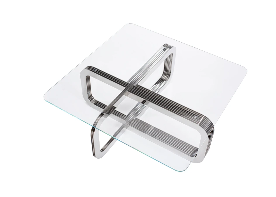 As a functional, chrome sculpture in the centre of the room, the Ebb & Flow coffee table served as the stylistic basis for the creation of the entire collection