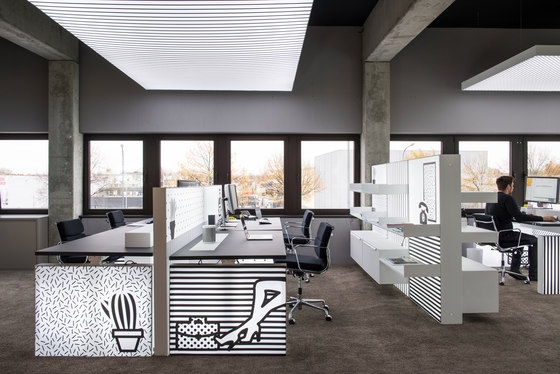 PIXLIP's offices are filled with their own light box and illuminated wall products, providing function, decoration and humour to the workforce