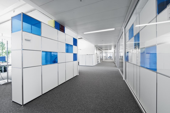 Modul Space storage can be utilised as partition or wall storage, and has the refreshing and helpful option of colourful glass sections
