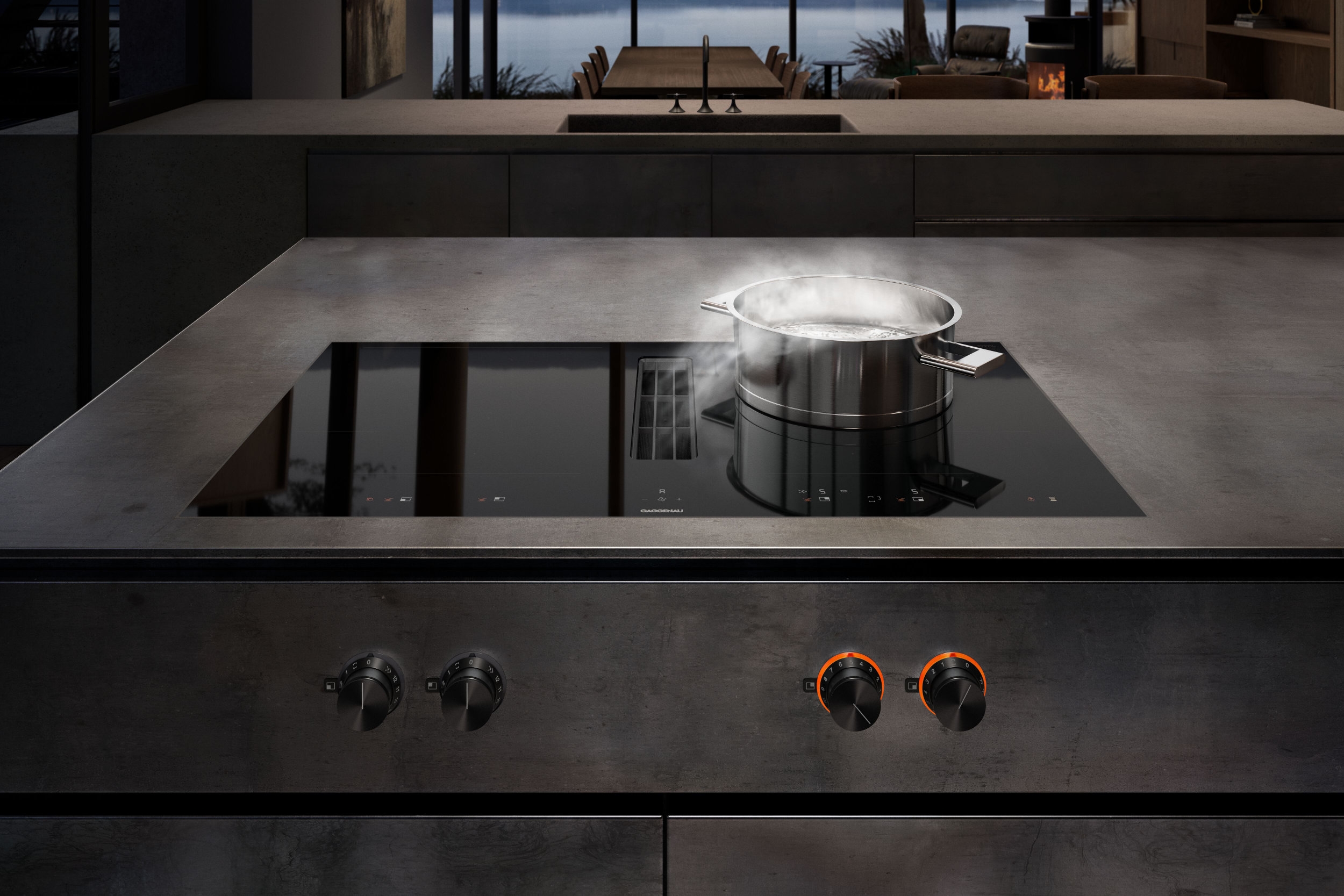 Harmonious design makes for a welcoming environment. Gaggenau’s Vario fridge-freezer combination and wine climate cabinet, and Flex induction cooktop with integrated ventilation system, both from the 400 series, blend in seamlessly with the architecture