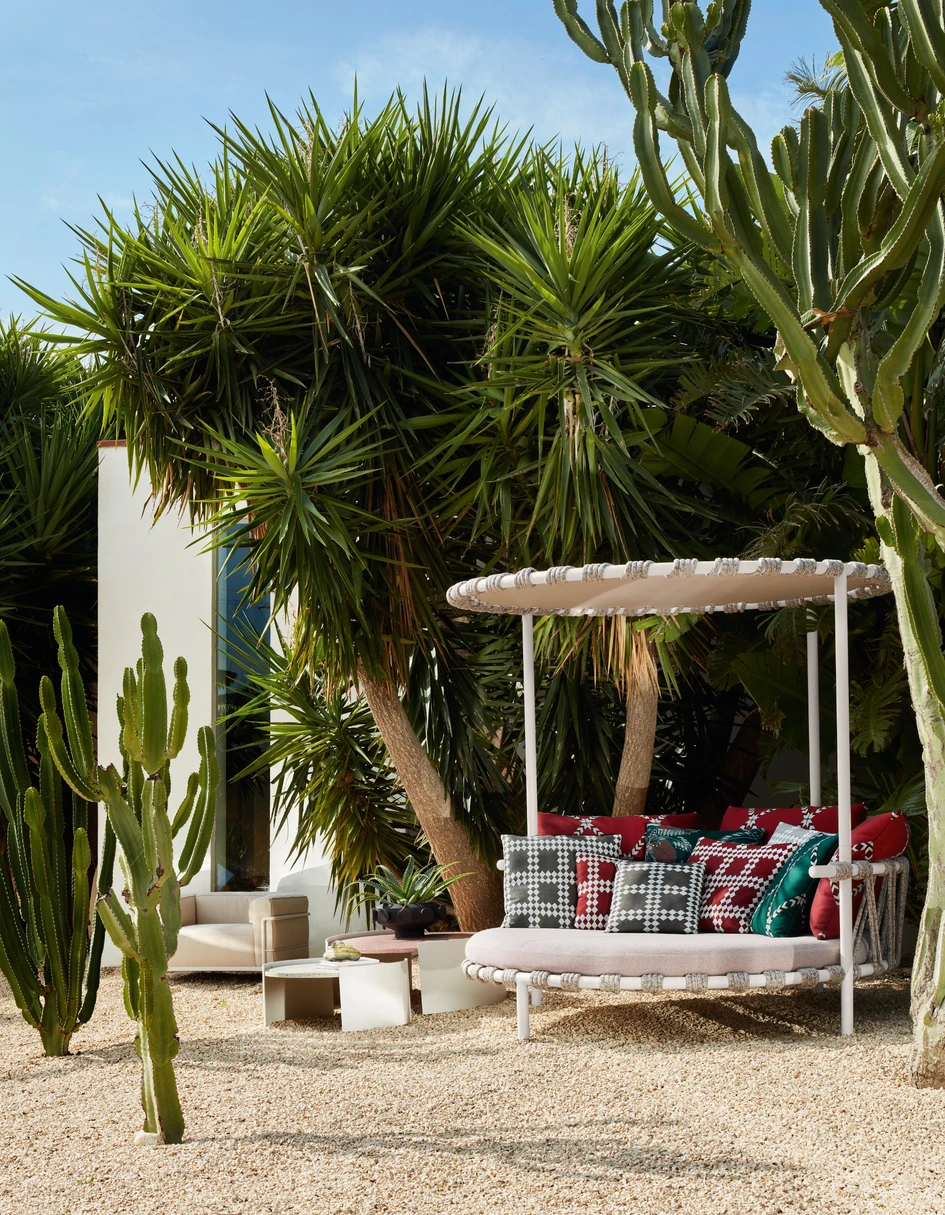 The Trampoline love bed, designed by Patricia Urquiola, has taken its form and detailing from the garden trampoline. It comes with an optional circular parasol shade. Photo: DePasquale+Maffini