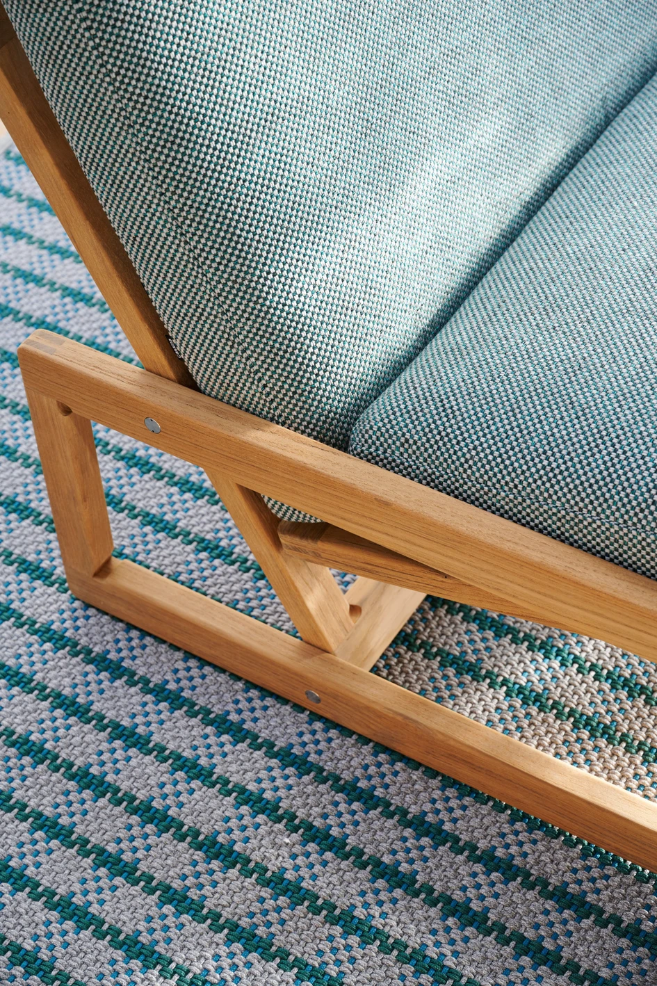 The Carlotta small armchair features thoroughly modern materials: its cushions are padded with PET fibres wrapped in water-repellent canvas. Photo: Valentina Sommariva