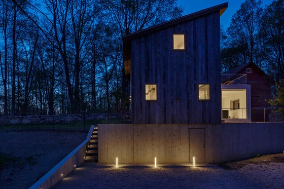 Both the Olzstyn Sports Center (top) and the Davis House (bottom) use recessed step lights to improve safety around the properties. Photo (Davis House): Elizabeth Felicella