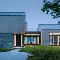 Maine Coast House by Marcus Gleysteen Architects uses freestanding and recessed porch lights to guide residents home. Photo: Trent Bell