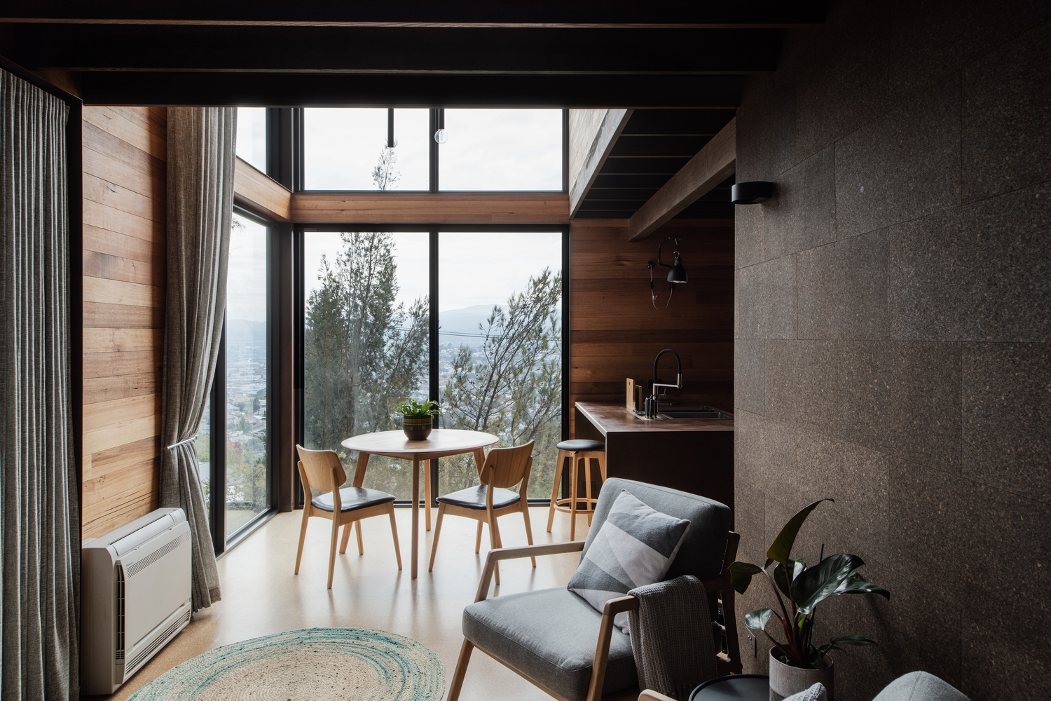 Gillian van der Schans' Birdhouse Studios are positioned on a hillside taking care to disturb as little of the natural scene as possible. Photo: Anjie Blair