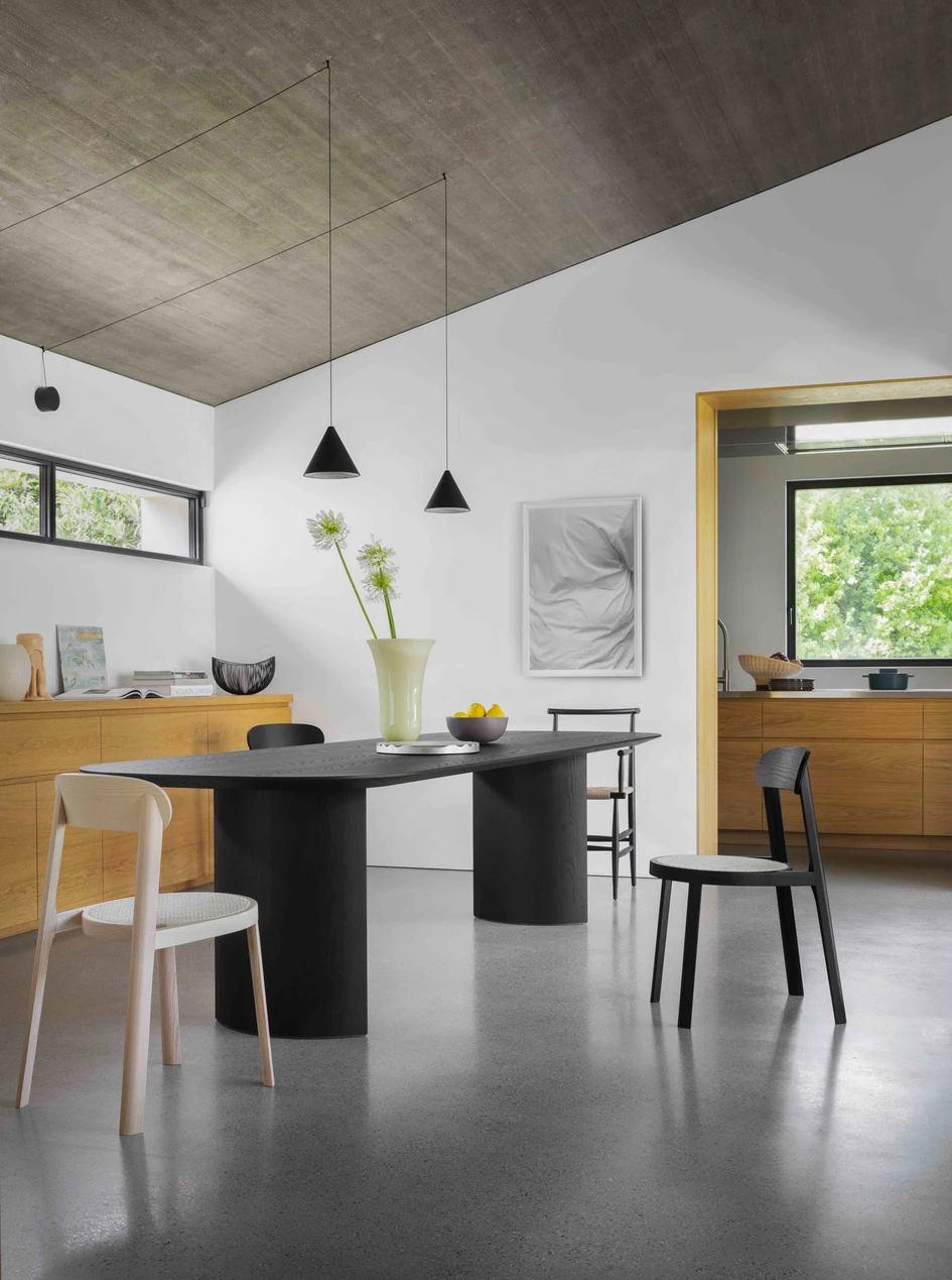 The monumental Plauto table by Paolo Cappello and Simone Sabatti has monolith-inspired legs