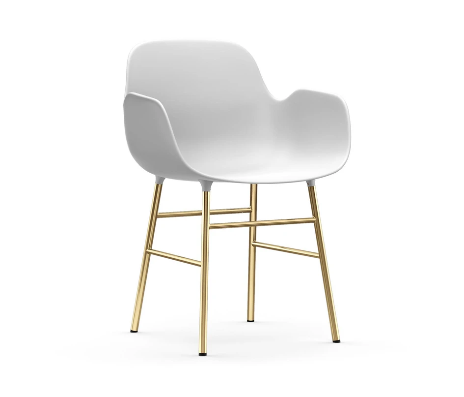 The Green House's glass extension (top) guides light through its well-placed windows (middle), while the metal legs of Normann Copenhagen's Form chair shine (bottom). Photos: Tia Borgsmidt (top, middle)