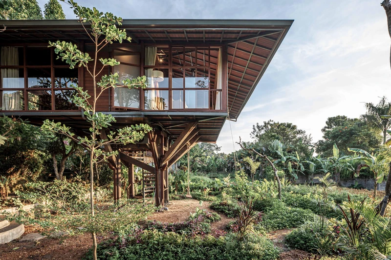 The raised balcony at Hubertus Hotel (top) supports a better view both across and below, while supports at the Floris (middle) and Treehouse (bottom) homes protect space underneath. Photos: Alex Filz (top, middle) Arley Mardo (bottom)