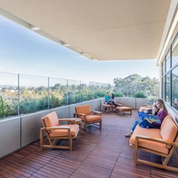 Maggie's Centre Leeds is tucked away in a bubble of nature (top) and the Lucile Packard Children's Hospital has outdoor spaces to play and rest (middle, bottom). Photos: Hufton+Crow (top), Steve Babuljak (middle), Emily Hagopian (bottom)