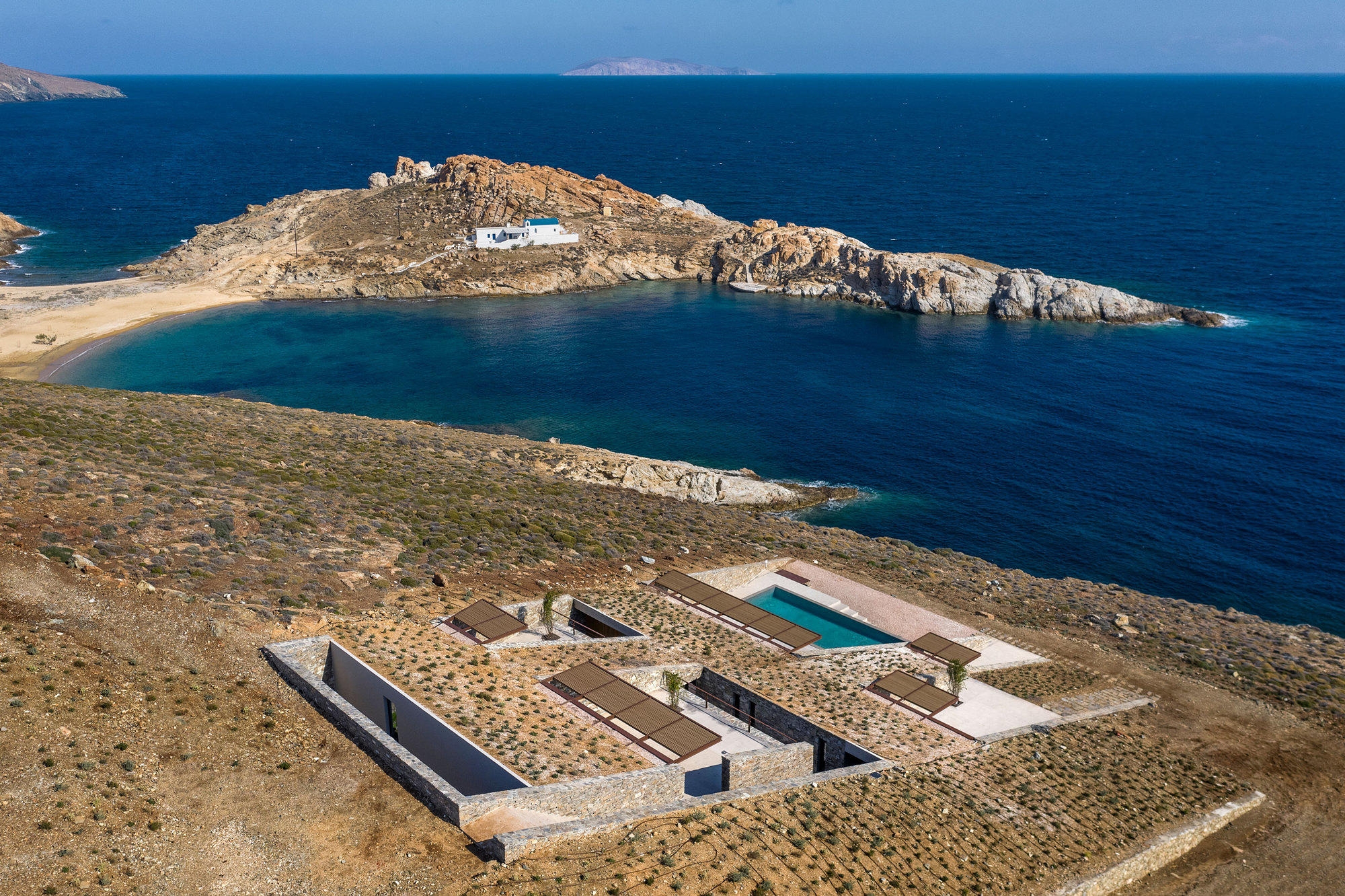 House on the Hill by HW Studio (top, middle) and NCaved House by MOLD Architects (bottom). Photos: César Béjar Studio (top), Danae Alonso (middle), Yiorgis Yerolymbos (bottom)
