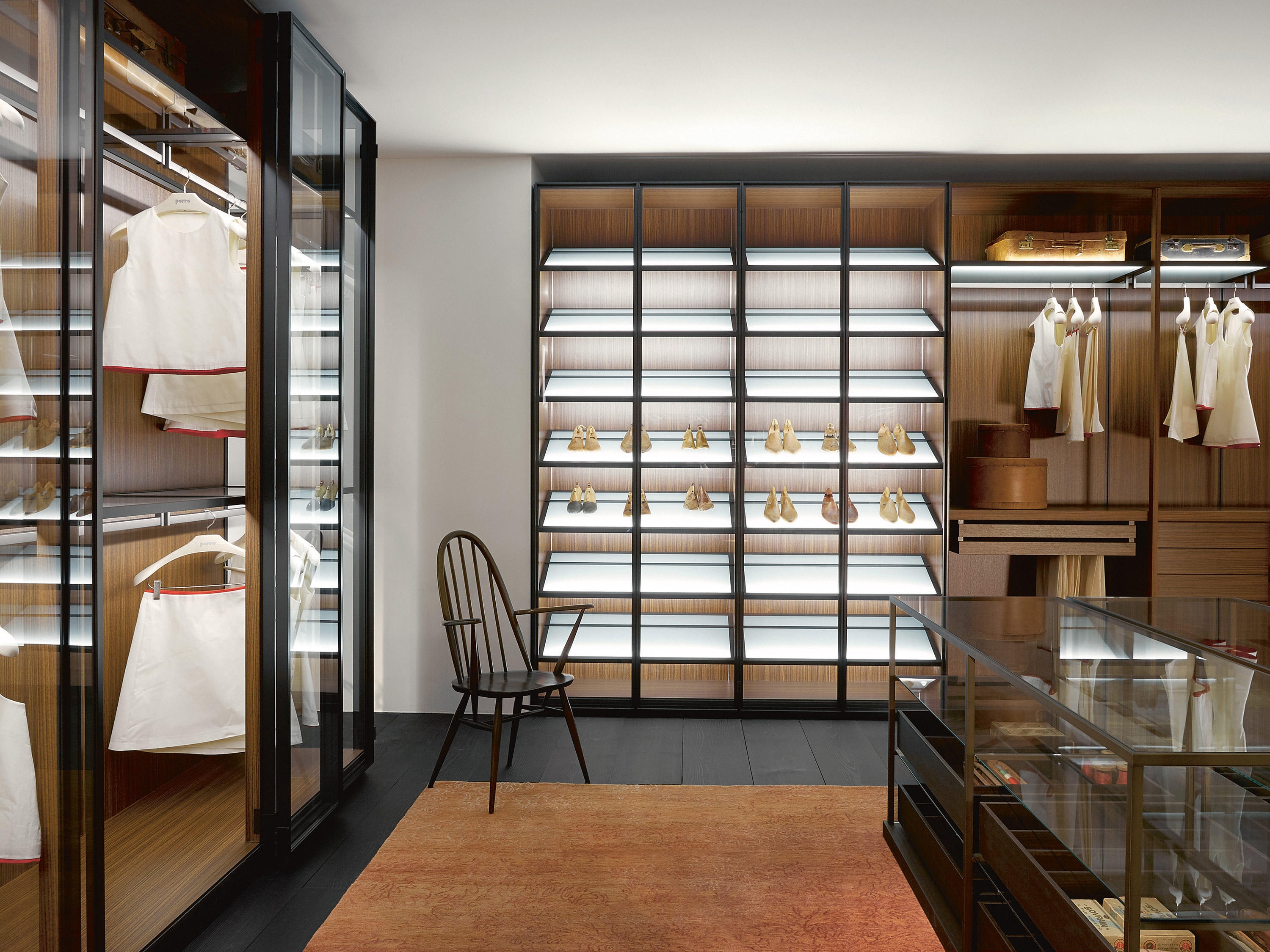 By concentrating on individually lighting shelves, rails and sections, as Porro's storage dressing room does, everything stays in its best light