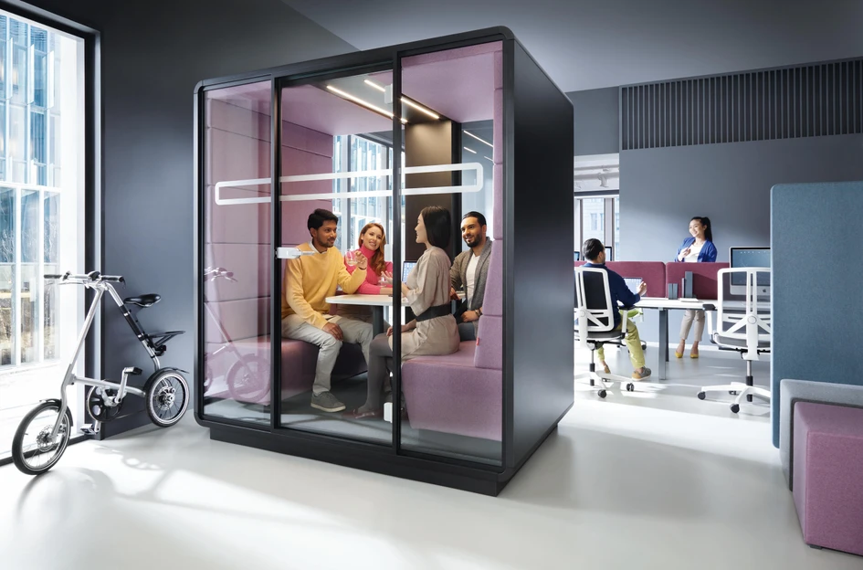 The HushMeet pod from Hushoffice has colourful wall- and ceiling-clad acoustic upholstery, making it supportive of various work and post-work activities without disturbing others