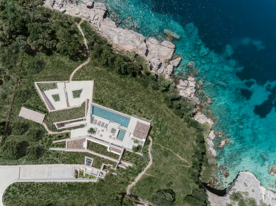 Vacationers at Villa Apollon can gaze out across the blue waters of the Ionian Sea in comfort, from the home’s varied pools and seats set across different heights. Photo: Yiorgos Kordakis