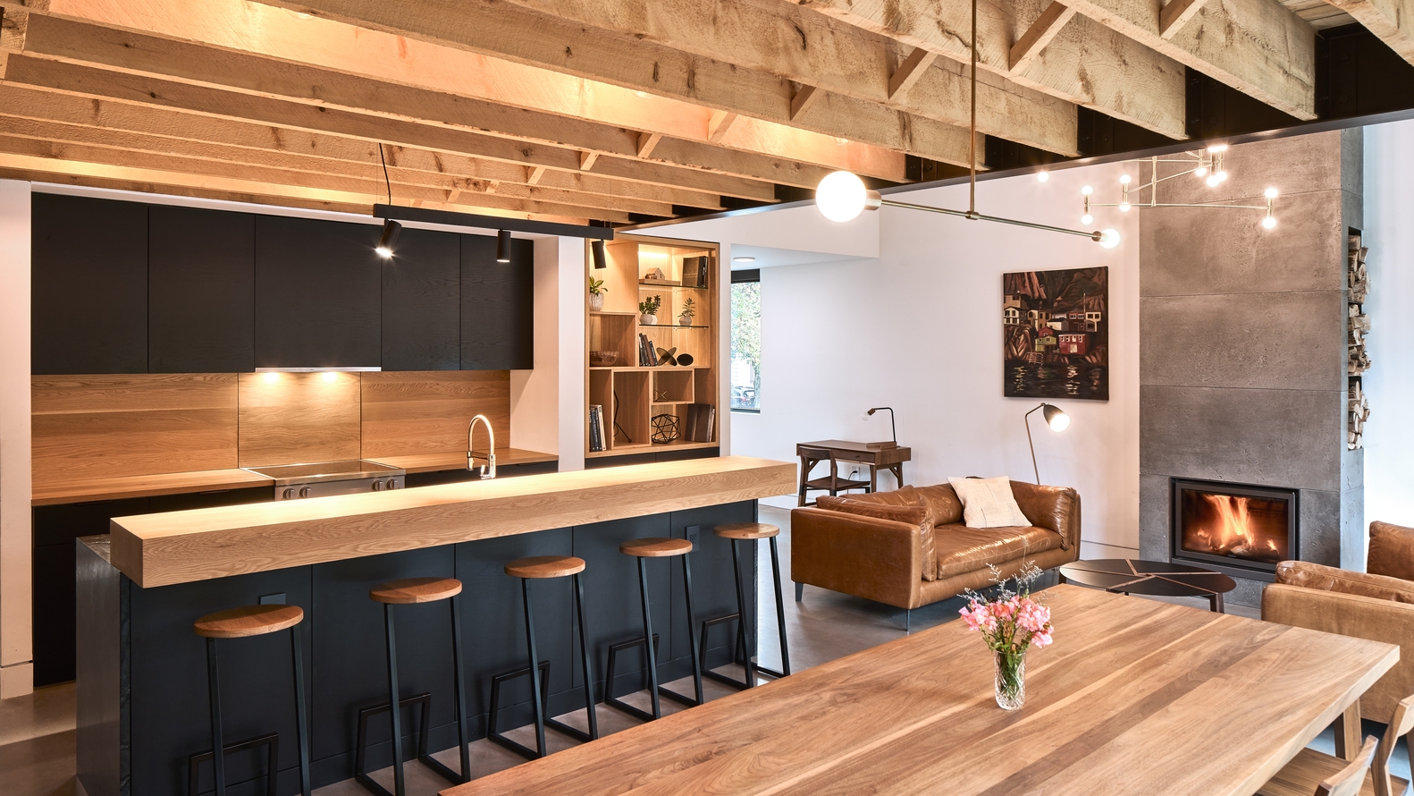 Armcrescent Residence’s contrasting chimney (top), slatted screen and hemlock rafters (middle) and warm feature kitchen (bottom). Photos: Peter Braithwaite (top), Julian Parkinson (middle, bottom)