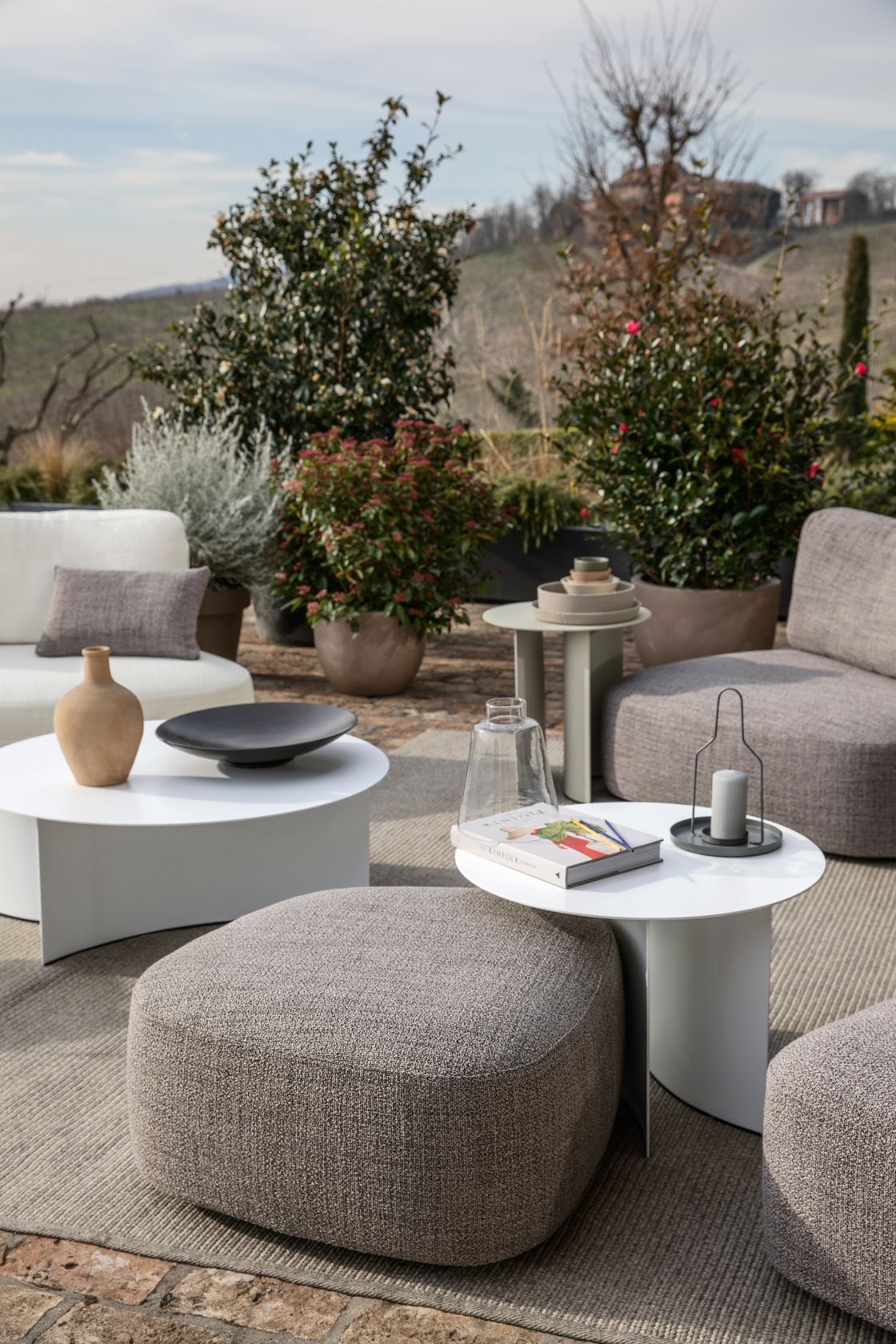 The lively Pierre chairs and poufs can be specified with fabrics that make them suitable for outdoor use
