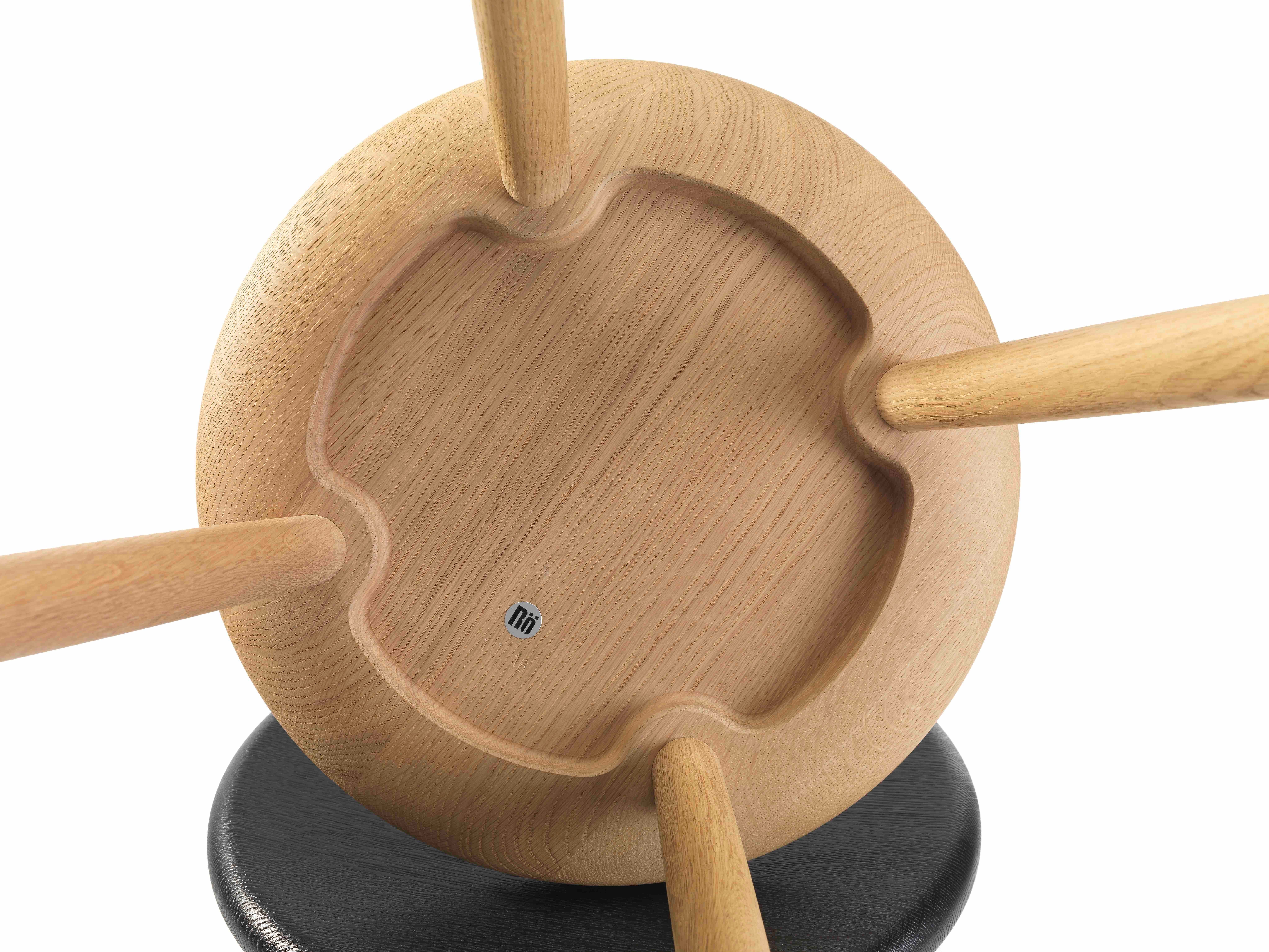Many of Röthlisberger's pieces of furniture are characters. In the case of Stabellö, Tomoko Azumi has replaced the recess in the backrest with two holes and slightly exaggerated the silhouette, giving the chairs the appearance of friendly companions