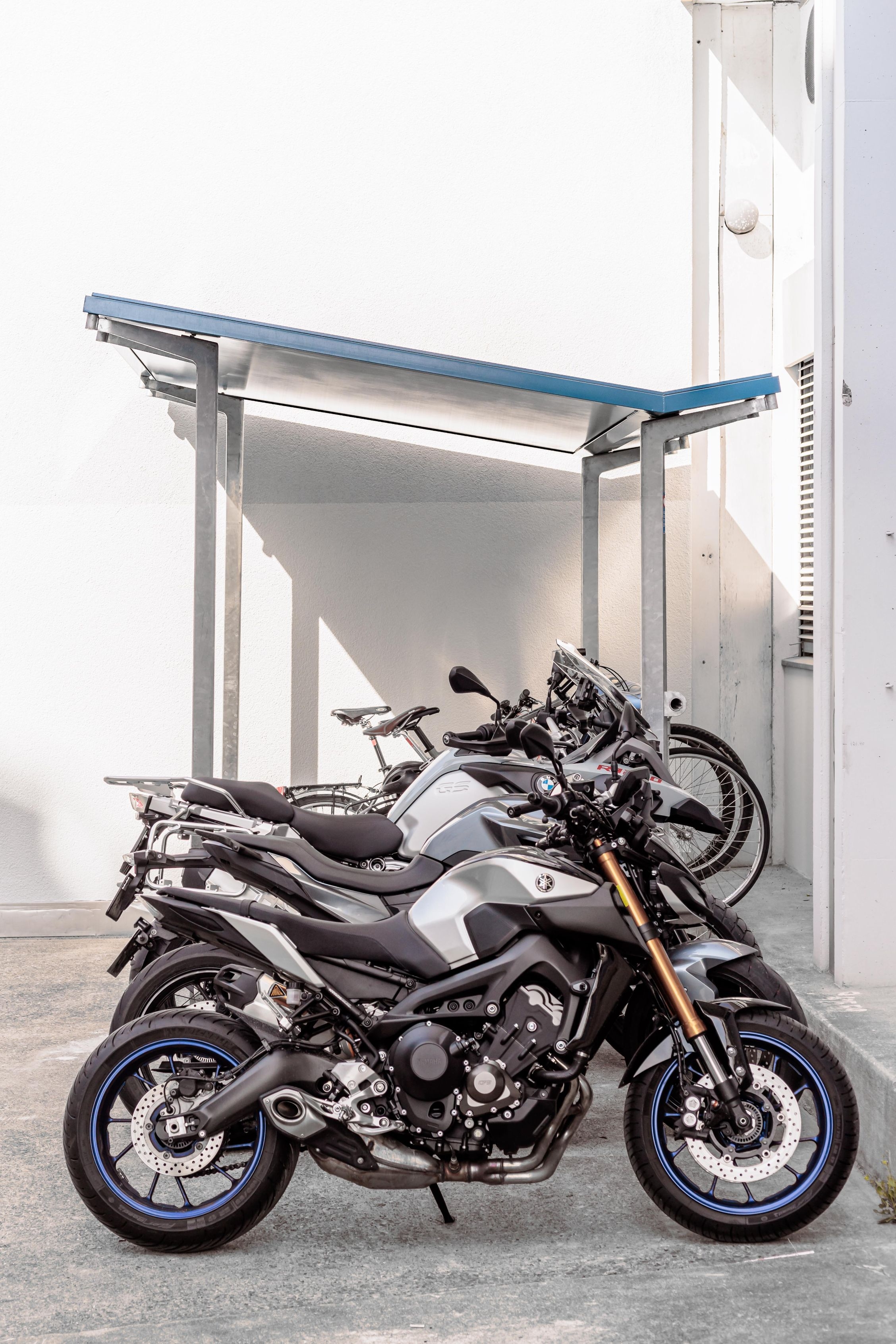 The Akira roof system can be used as a bicycle shelter, rain protection or offer much needed shade during hot summer months