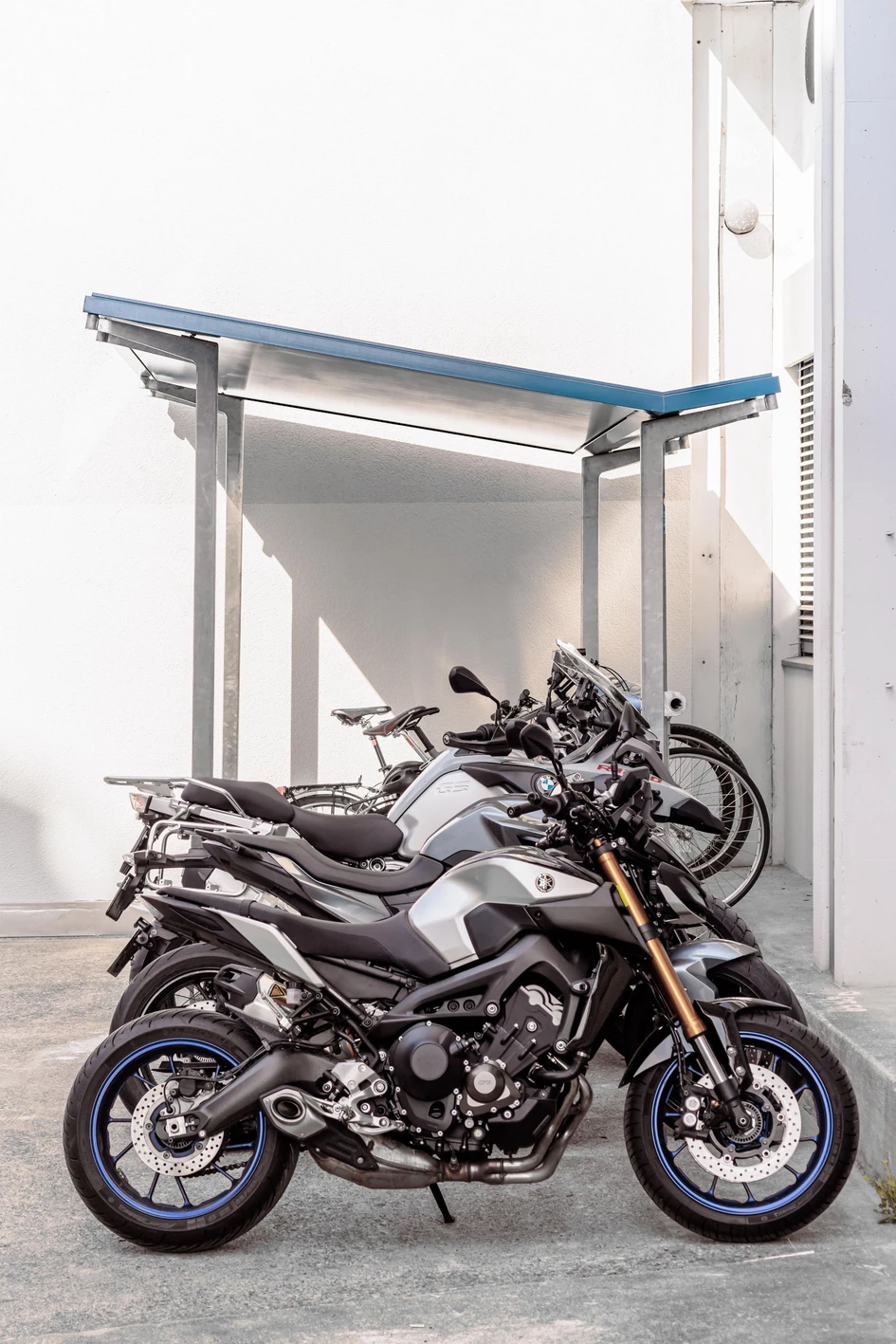 The Akira roof system can be used as a bicycle shelter, rain protection or offer much needed shade during hot summer months