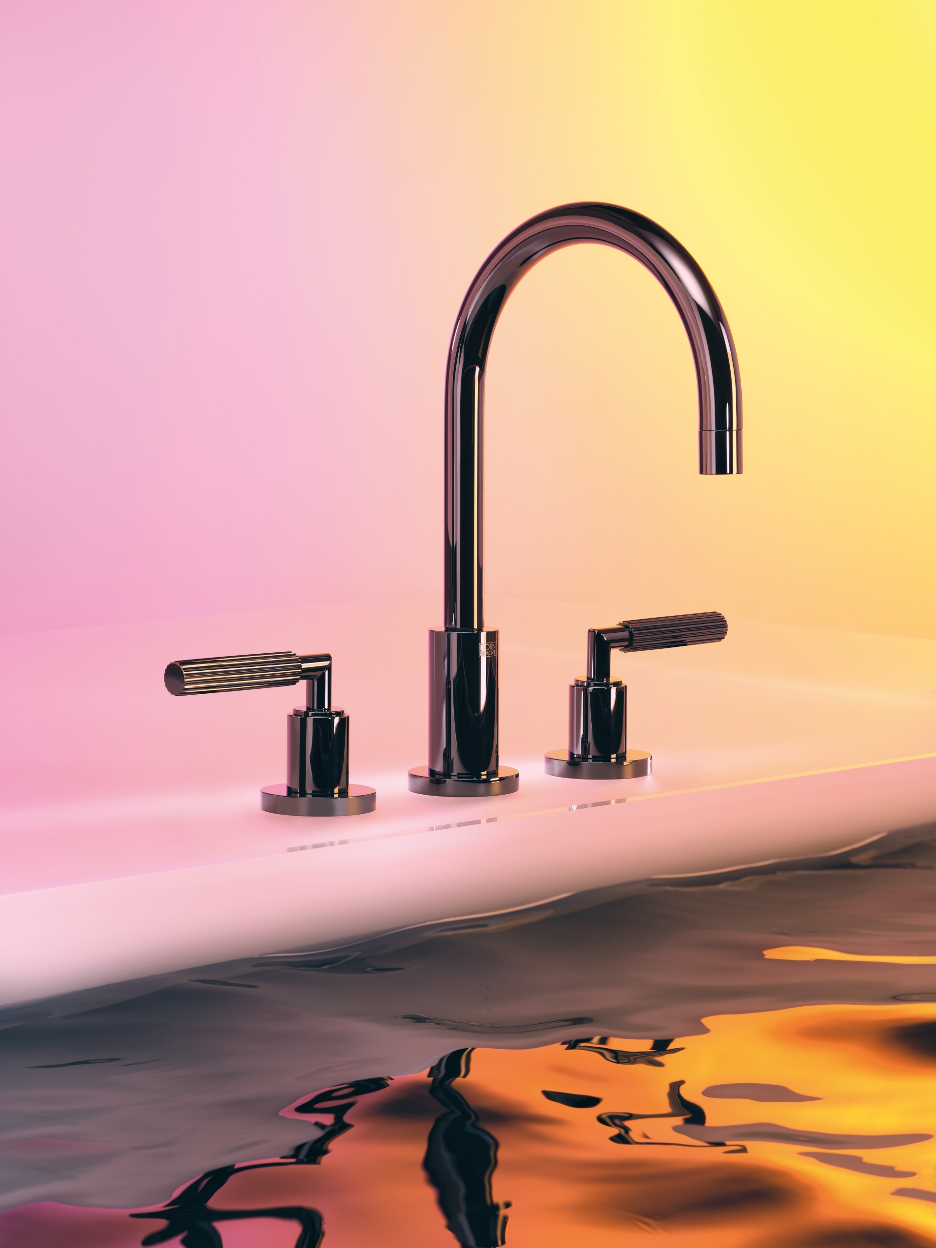 Tara in the new surface Champagne (top). Tara in Dark Chrome with lever handles (bottom)