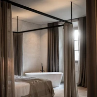 A full-length skylight (top) brings light to the corridor (middle) of this Italian ex-monastery, making the soft tones and acoustic ambience of the room (bottom) the place to be. Photos: Alex Filz
